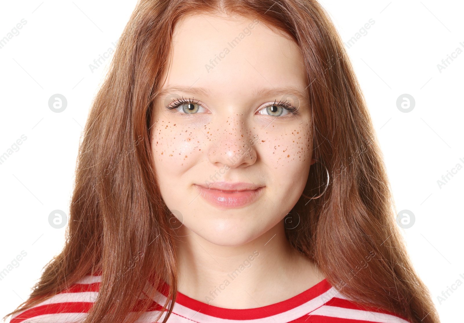 Photo of Beautiful teenage girl with freckles on white background, closeup