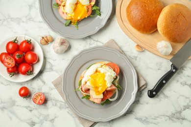 Photo of Flat lay composition with tasty brunch served on white marble table