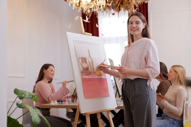 Group of women learning to draw in class