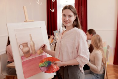 Group of women learning to draw in class