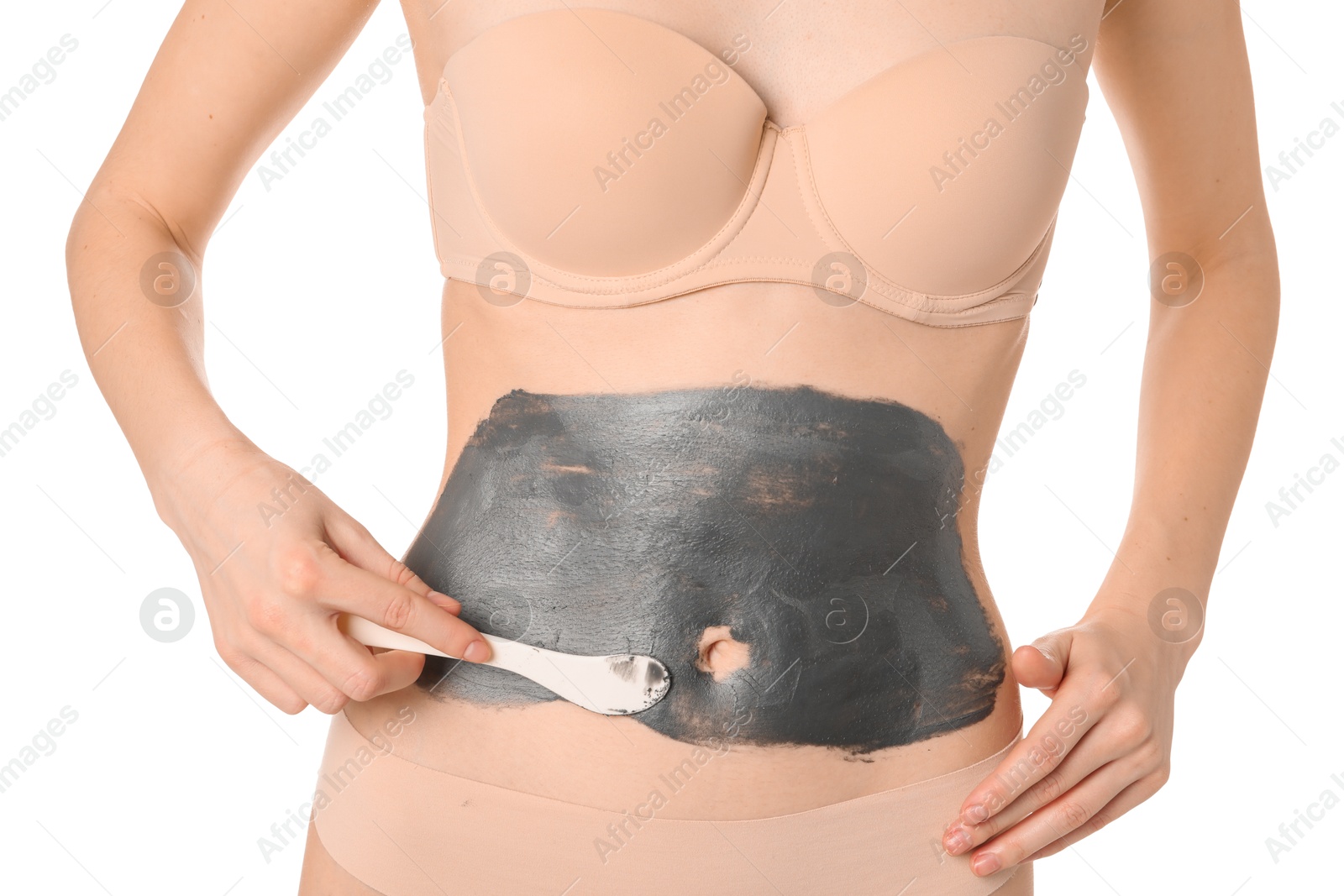 Photo of Woman applying cosmetic product for spa body wraps onto her belly against white background, closeup