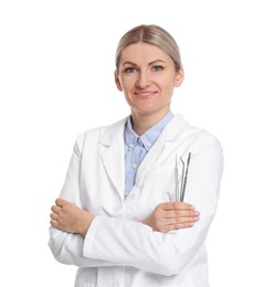 Photo of Professional dentist with tools on white background