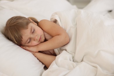 Bedtime. Cute little girl sleeping in bed