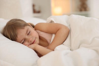 Bedtime. Cute little girl sleeping in bed