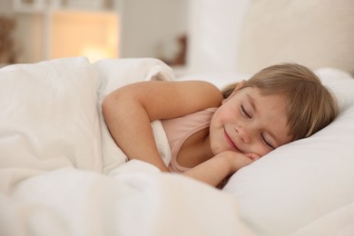 Bedtime. Cute little girl sleeping in bed