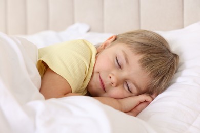 Bedtime. Cute little girl sleeping in bed