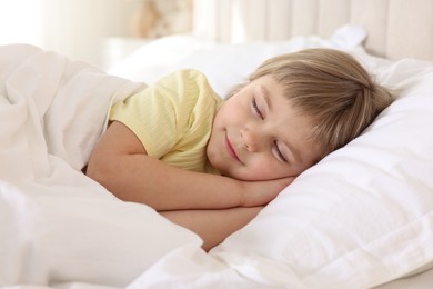 Bedtime. Cute little girl sleeping in bed