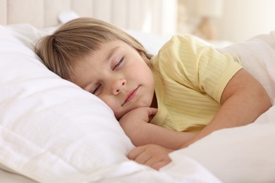 Bedtime. Cute little girl sleeping in bed