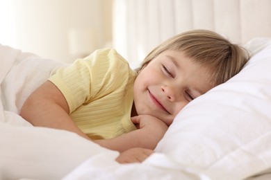 Photo of Bedtime. Cute little girl sleeping in bed