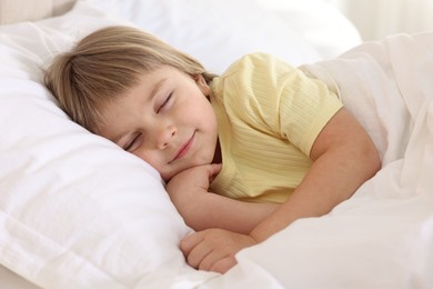 Bedtime. Cute little girl sleeping in bed