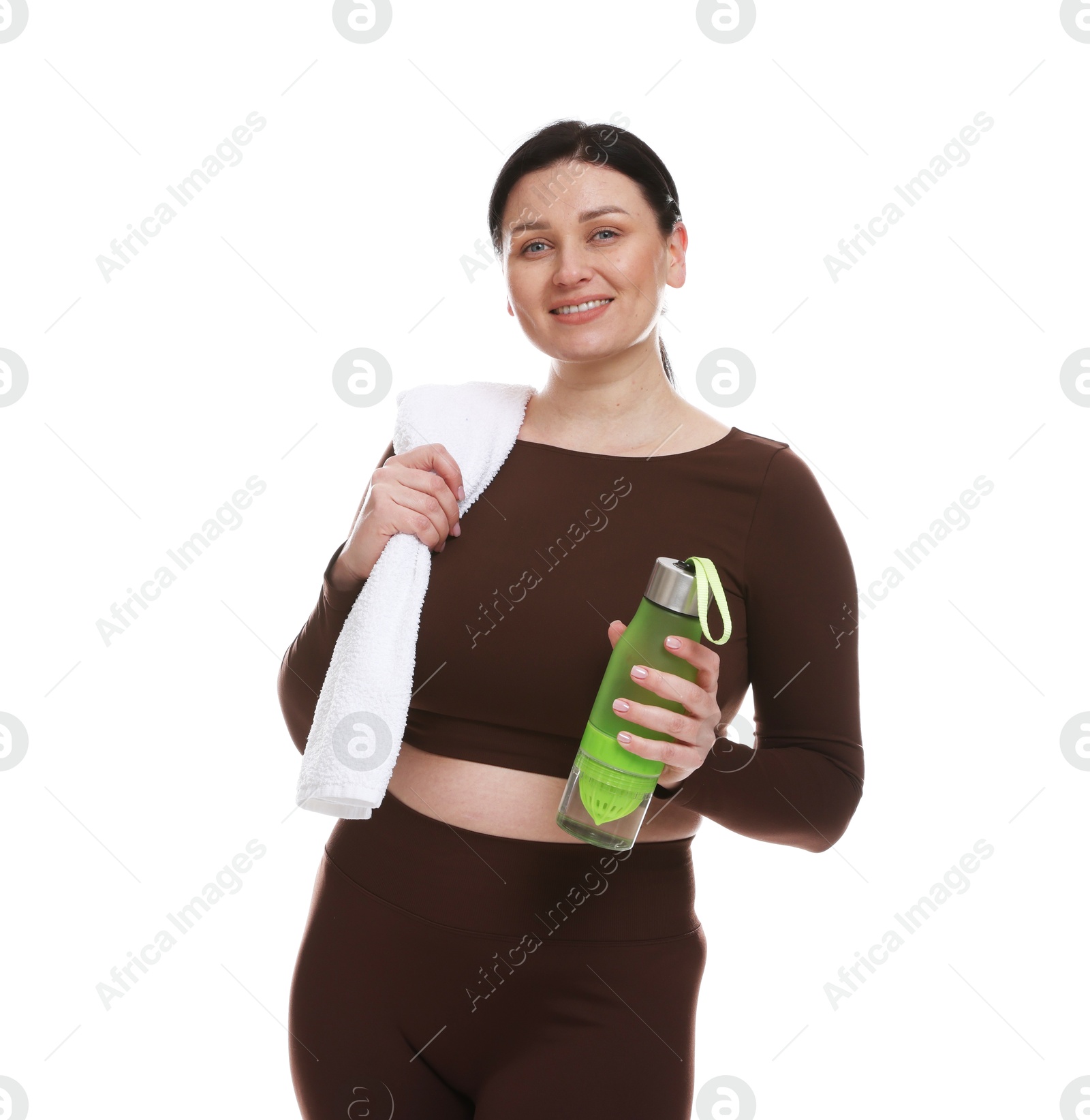 Photo of Plus size woman in gym clothes with towel and water bottle on white background