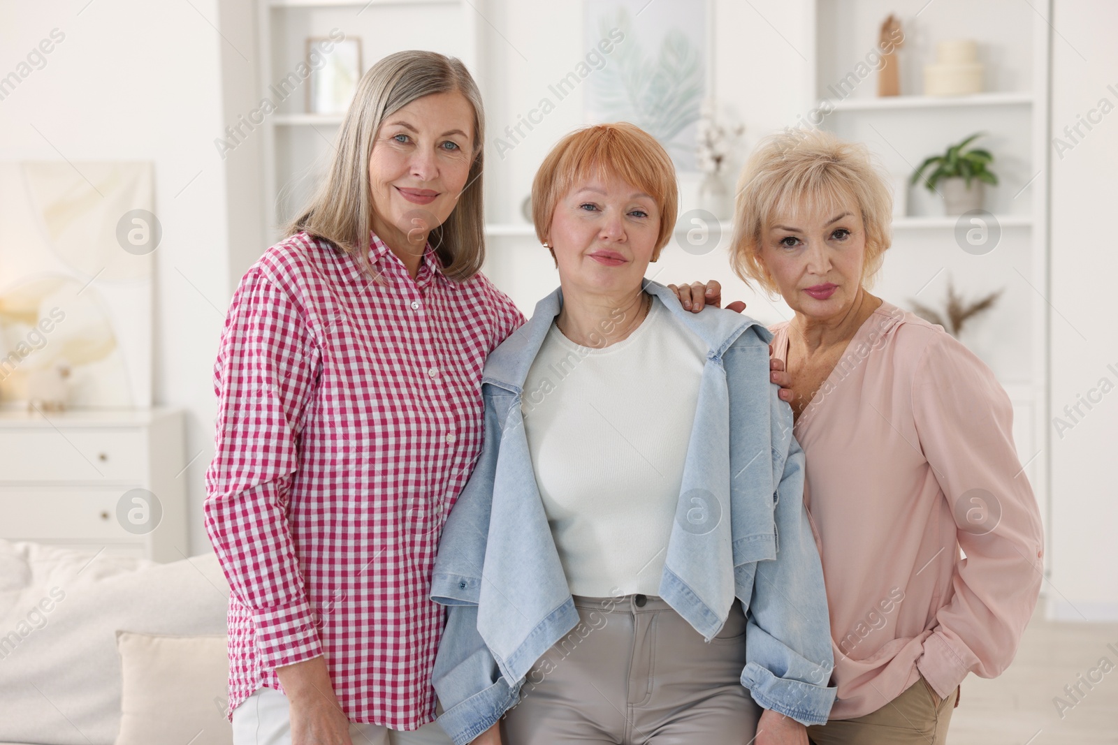 Photo of Friendship. Portrait of senior women at home