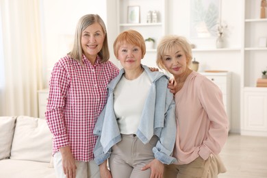 Photo of Friendship. Portrait of senior women at home