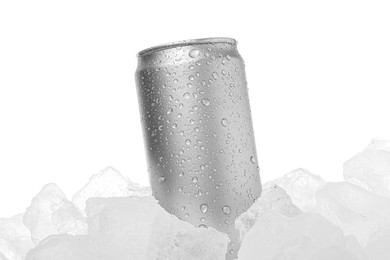 Photo of Refreshing drink in can on ice cubes against white background