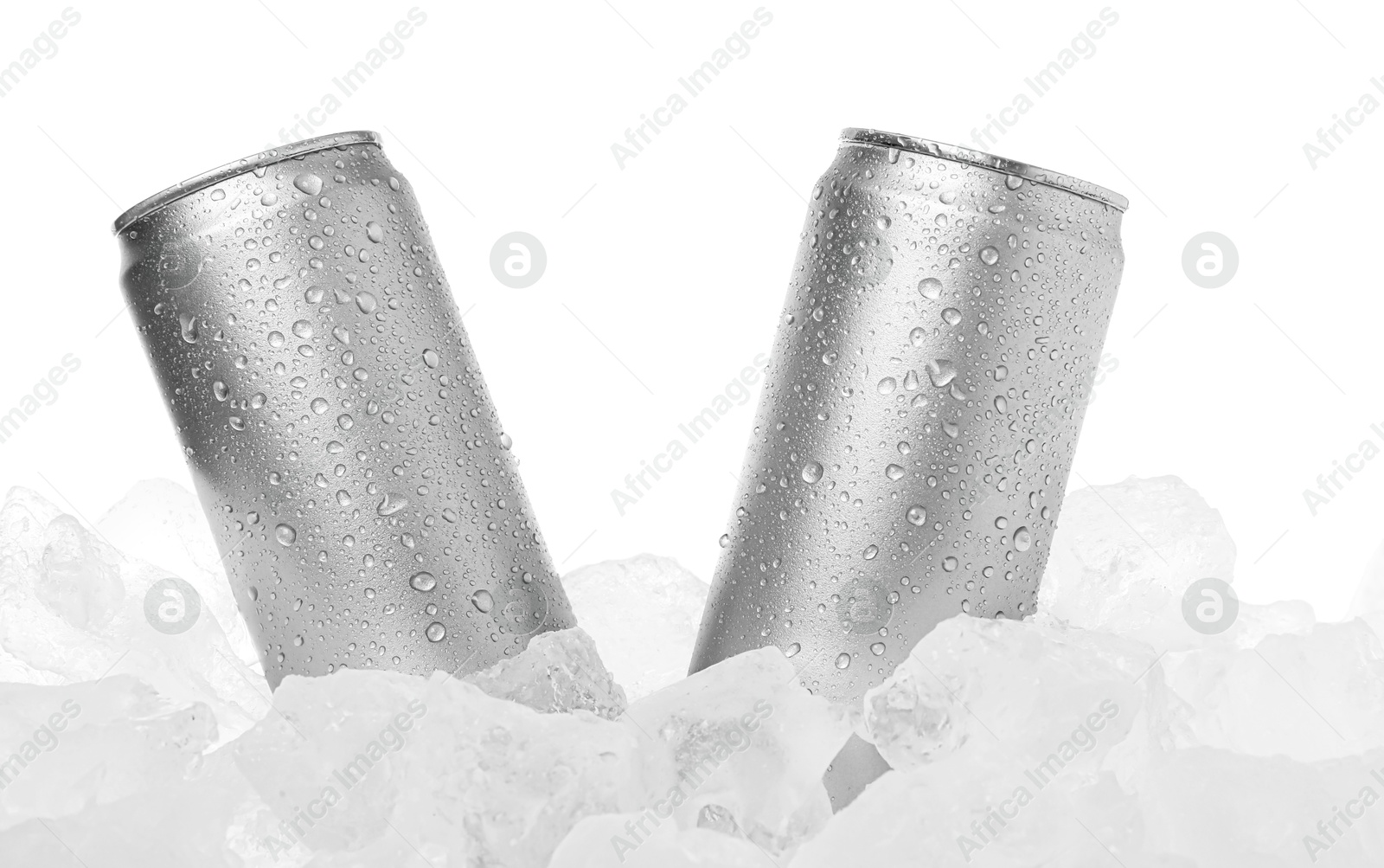 Refreshing drinks in cans on ice cubes against white background Photo of Refreshing drinks in cans on ice cubes against white background