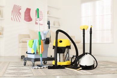 Photo of Professional cleaning appliances and supplies at home