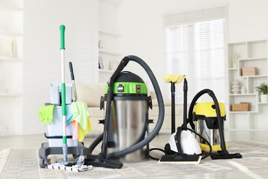 Photo of Professional cleaning appliances and supplies at home