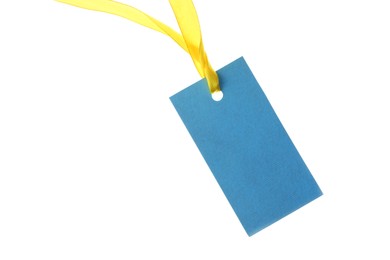 Photo of Blank tag with ribbon isolated on white