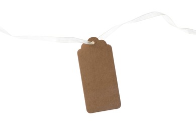 Photo of Blank tag with ribbon isolated on white