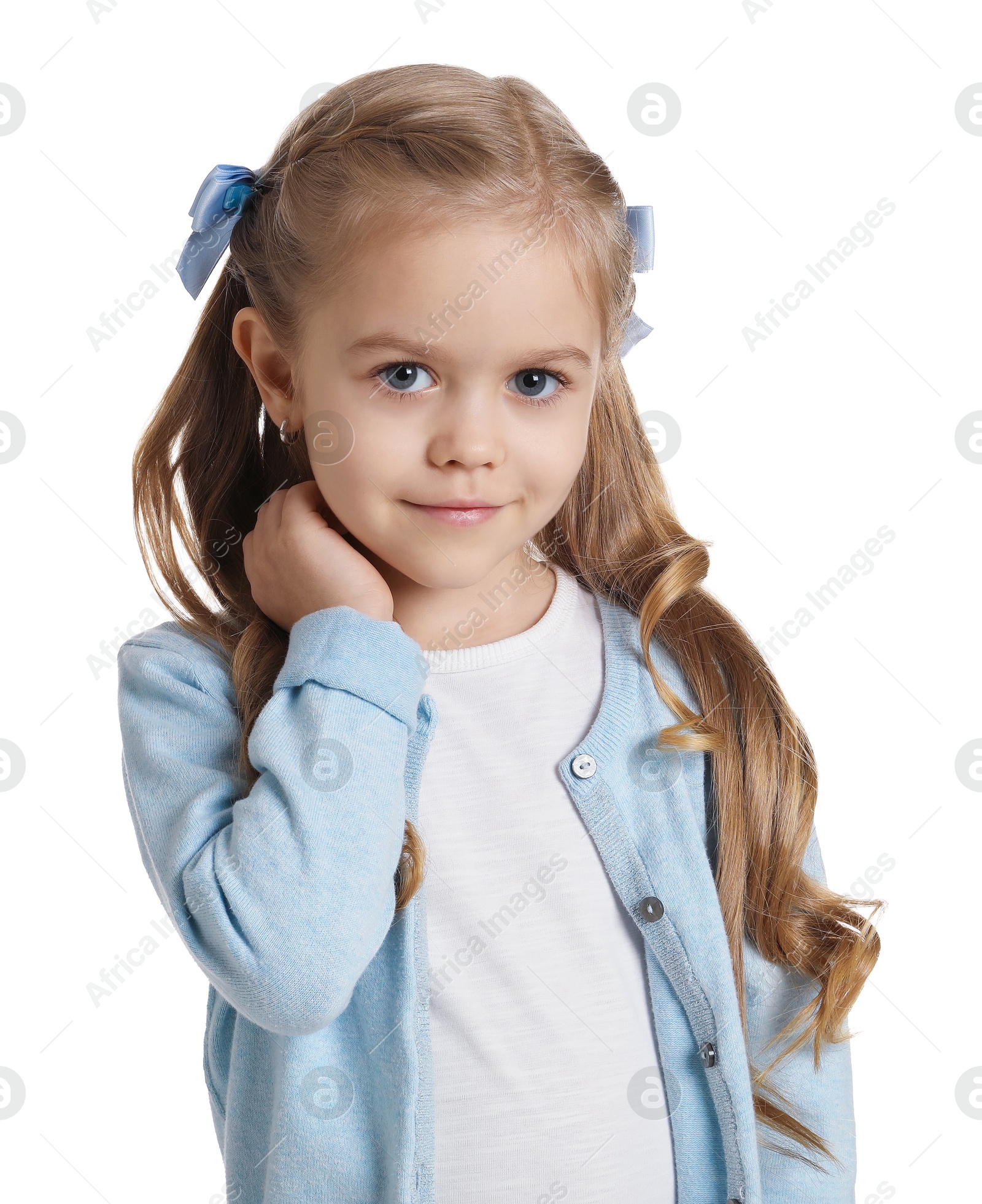 Photo of Cute little girl with beautiful hair accessory on white background