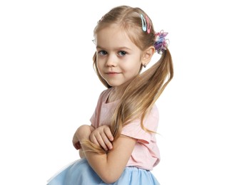 Photo of Cute little girl wearing beautiful hair accessories on white background