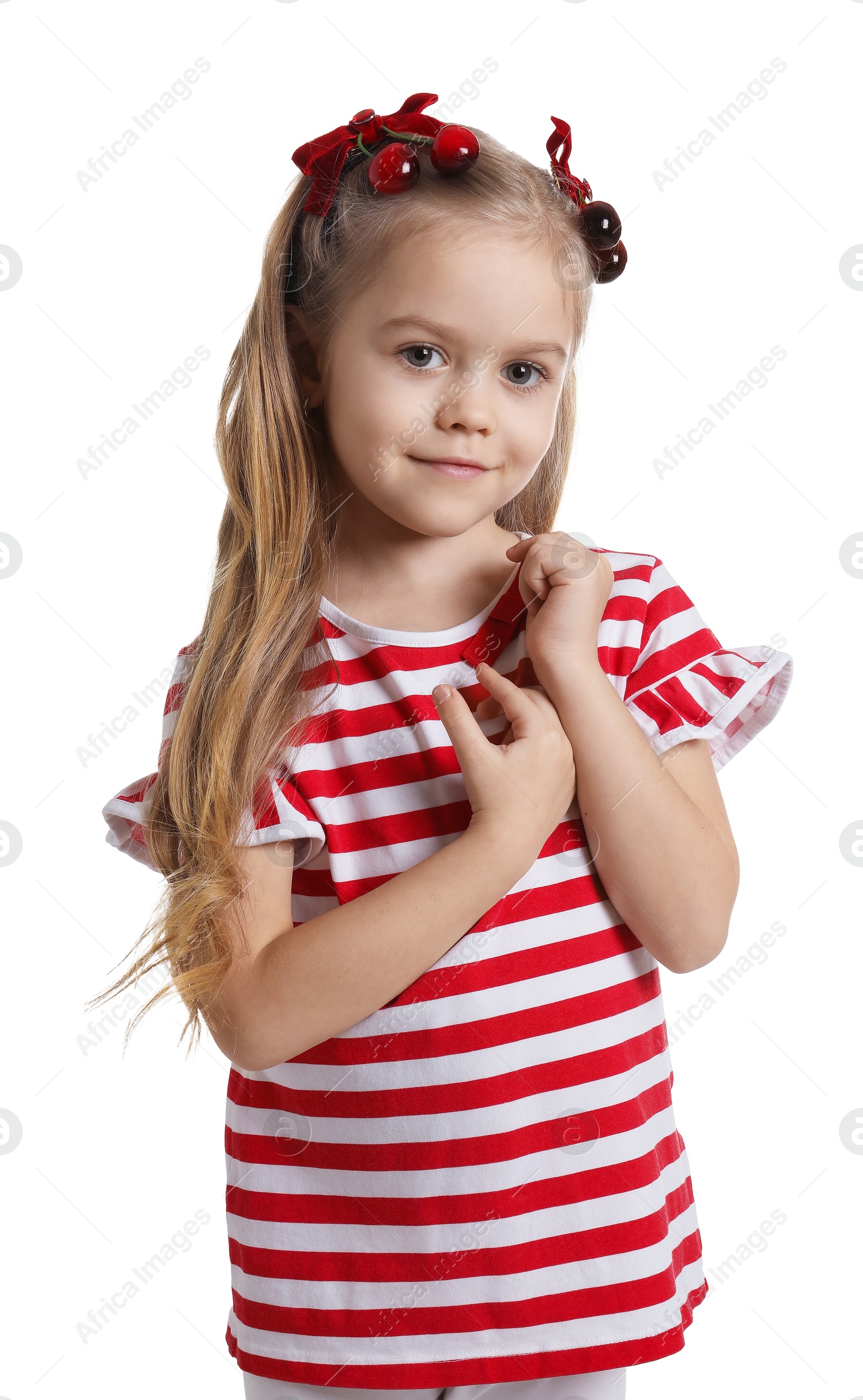 Photo of Cute little girl wearing beautiful bows with cherries on white background