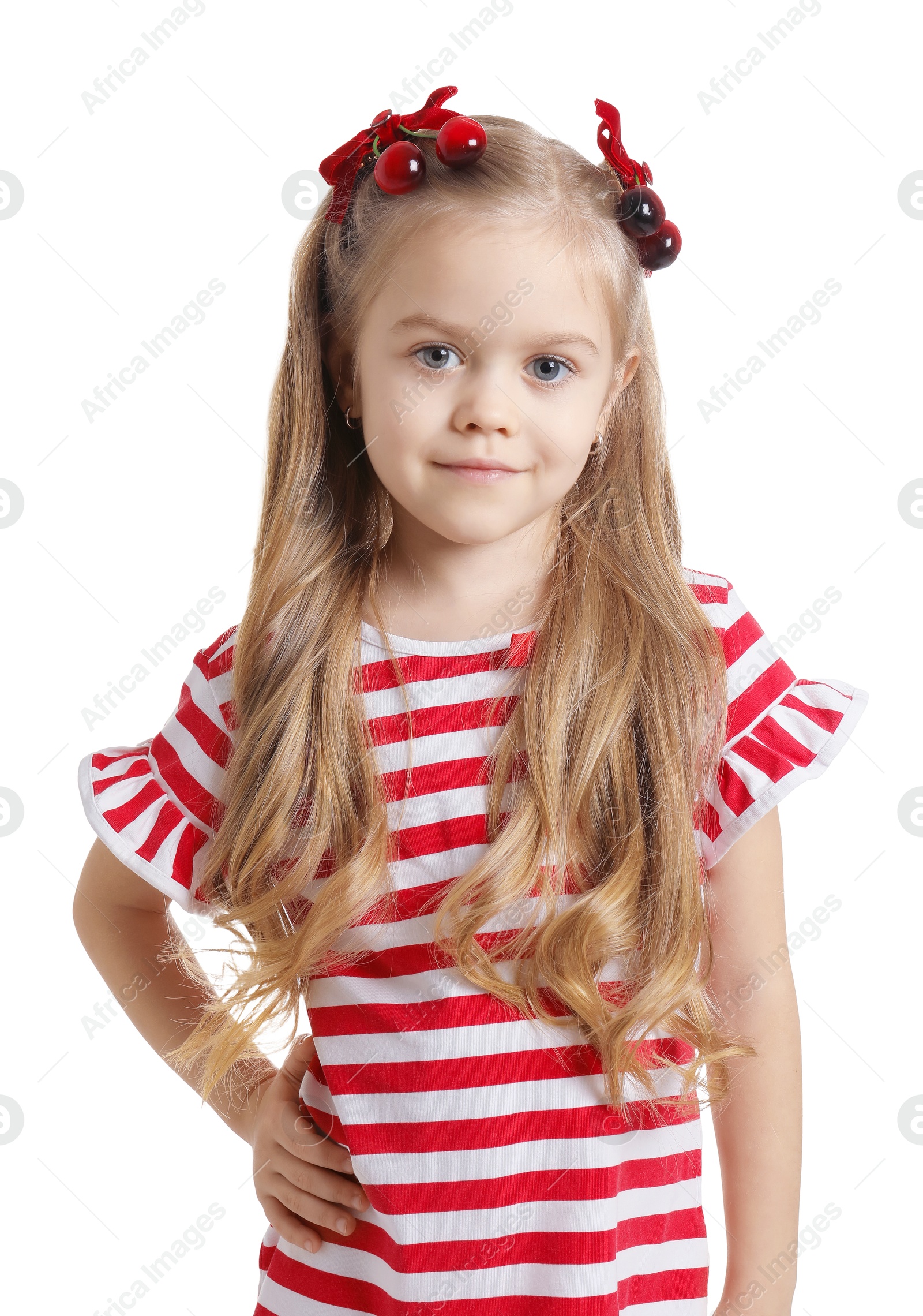 Photo of Cute little girl wearing beautiful bows with cherries on white background