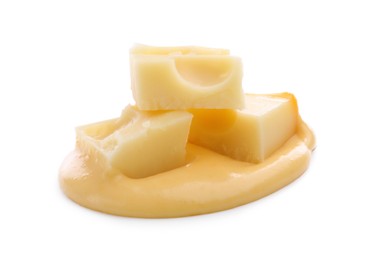 Photo of Tasty cheese dipping sauce and pieces of product isolated on white