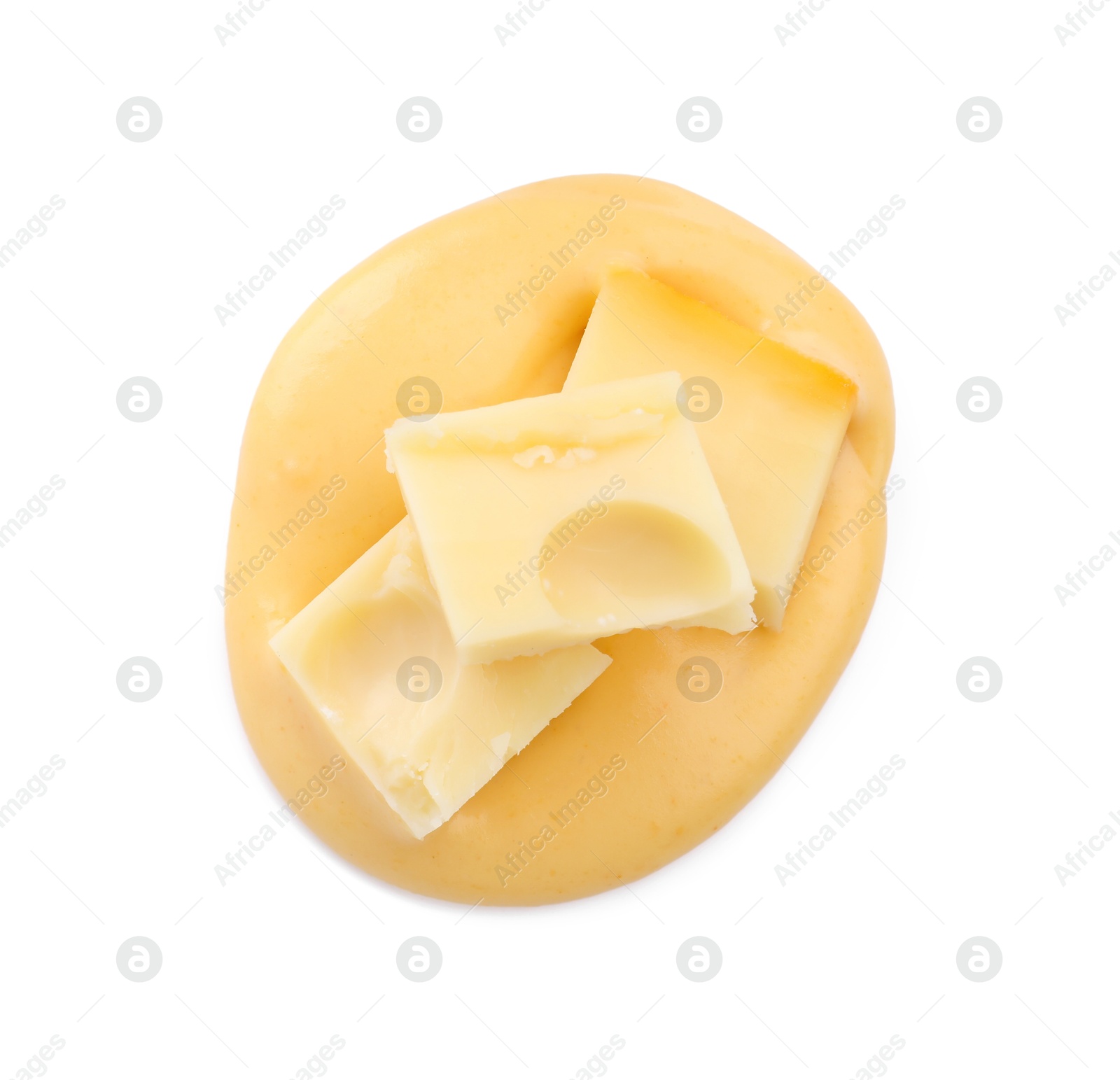 Tasty cheese dipping sauce and pieces of product isolated on white, top view Photo of Tasty cheese dipping sauce and pieces of product isolated on white, top view