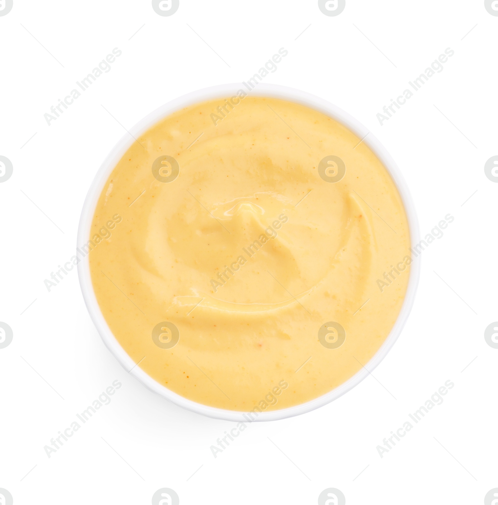 Tasty cheese dipping sauce in bowl isolated on white, top view Photo of Tasty cheese dipping sauce in bowl isolated on white, top view