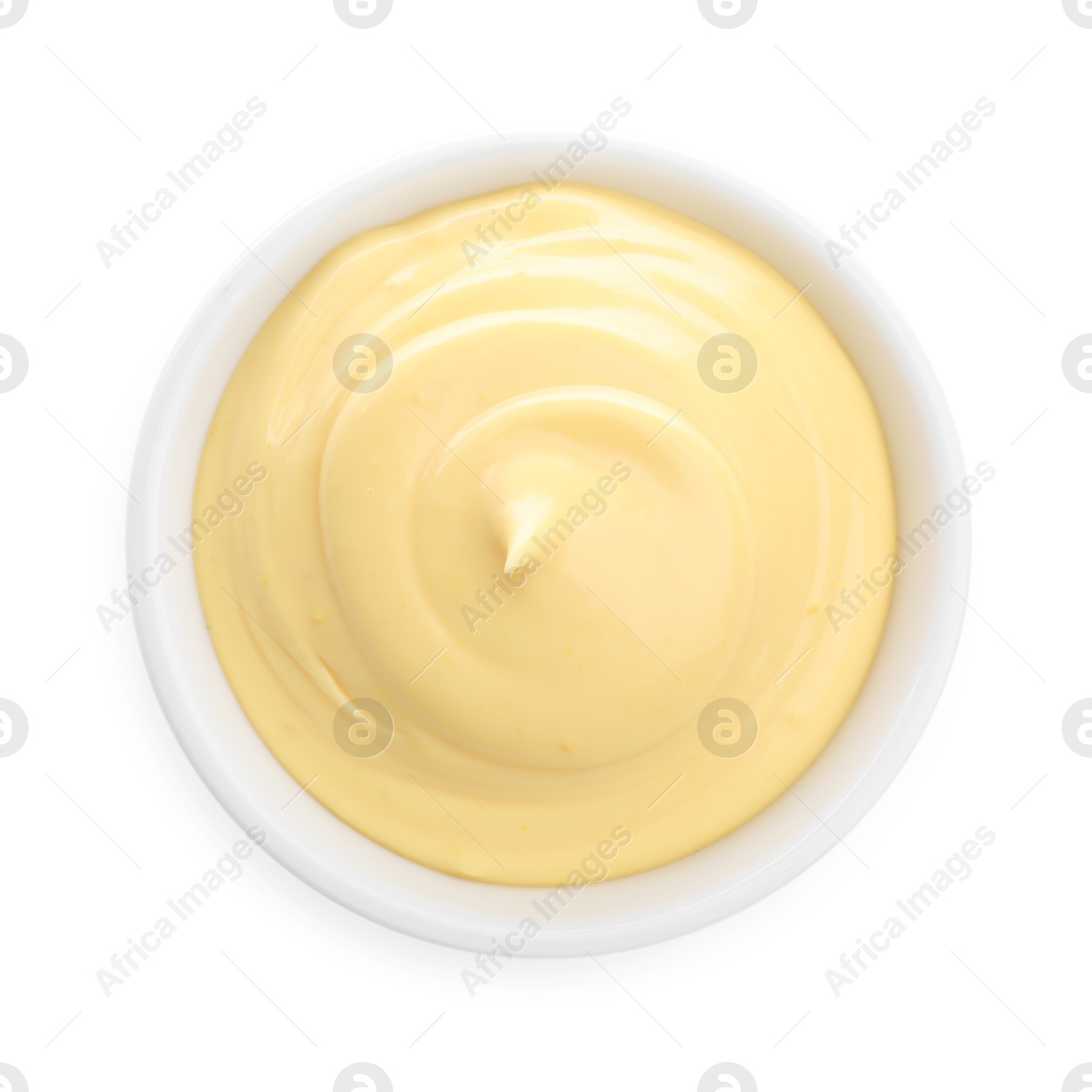 Tasty cheese dipping sauce in bowl on white background, top view Photo of Tasty cheese dipping sauce in bowl on white background, top view