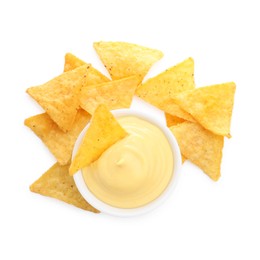 Photo of Tasty cheese dipping sauce in bowl and nacho chips isolated on white, top view