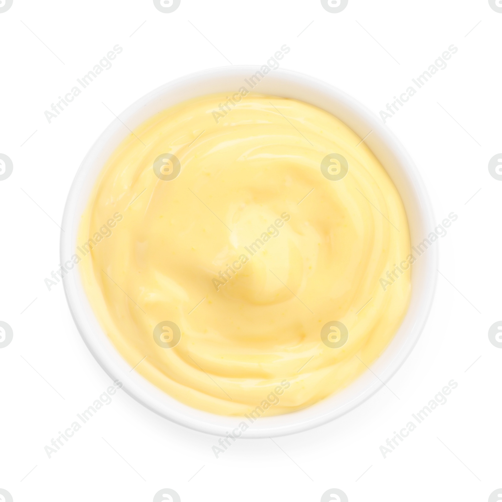 Tasty cheese dipping sauce in bowl isolated on white, top view Photo of Tasty cheese dipping sauce in bowl isolated on white, top view
