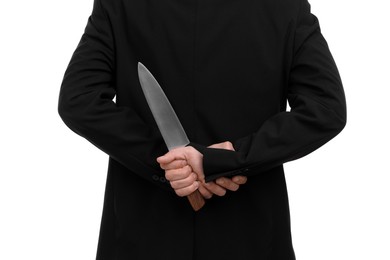 Photo of Businessman holding knife behind his back on white background, closeup