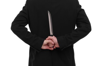 Photo of Businessman holding knife behind his back on white background, closeup