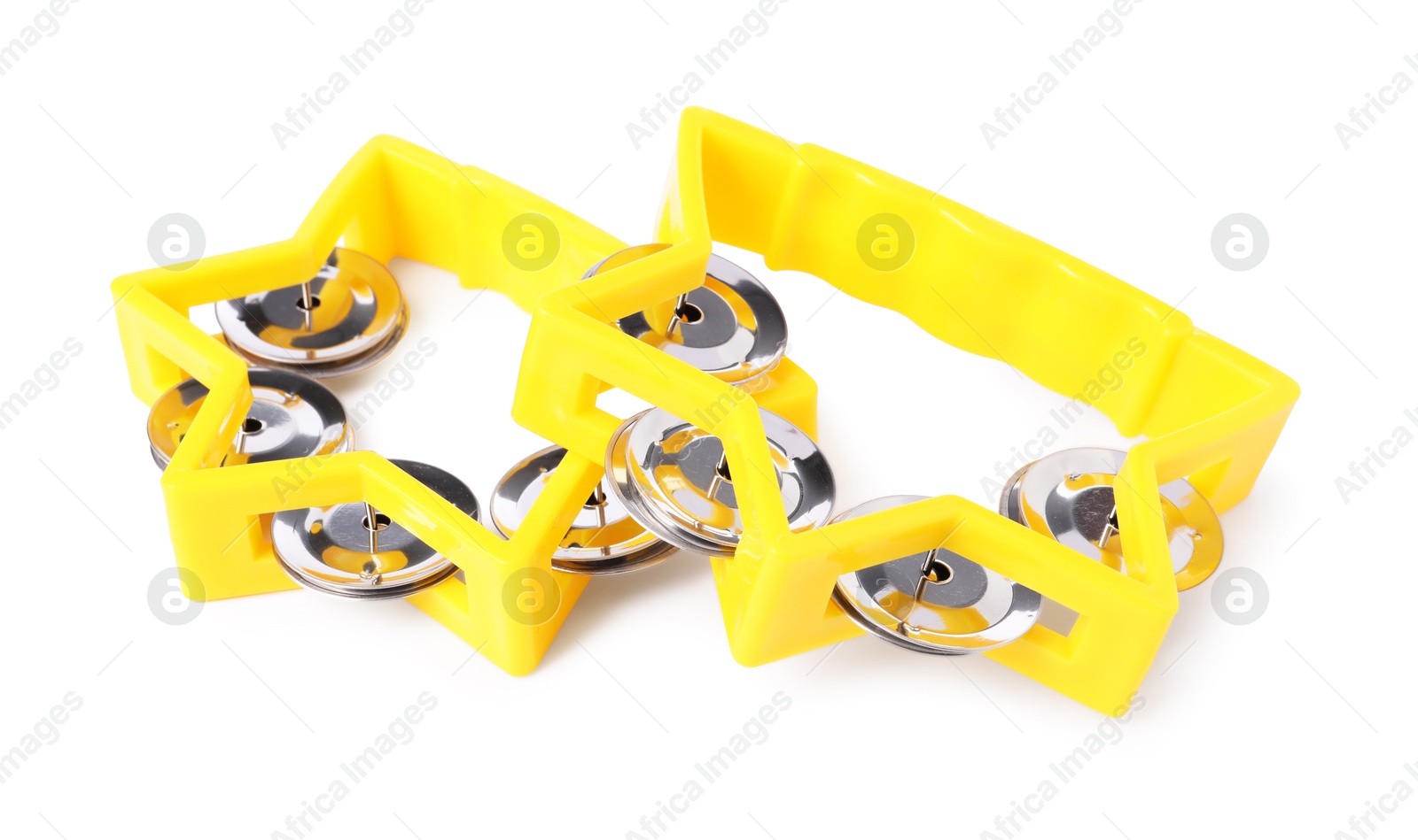 Photo of Yellow toy tambourines isolated on white. Child's musical instrument