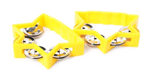 Yellow toy tambourines isolated on white. Child's musical instrument