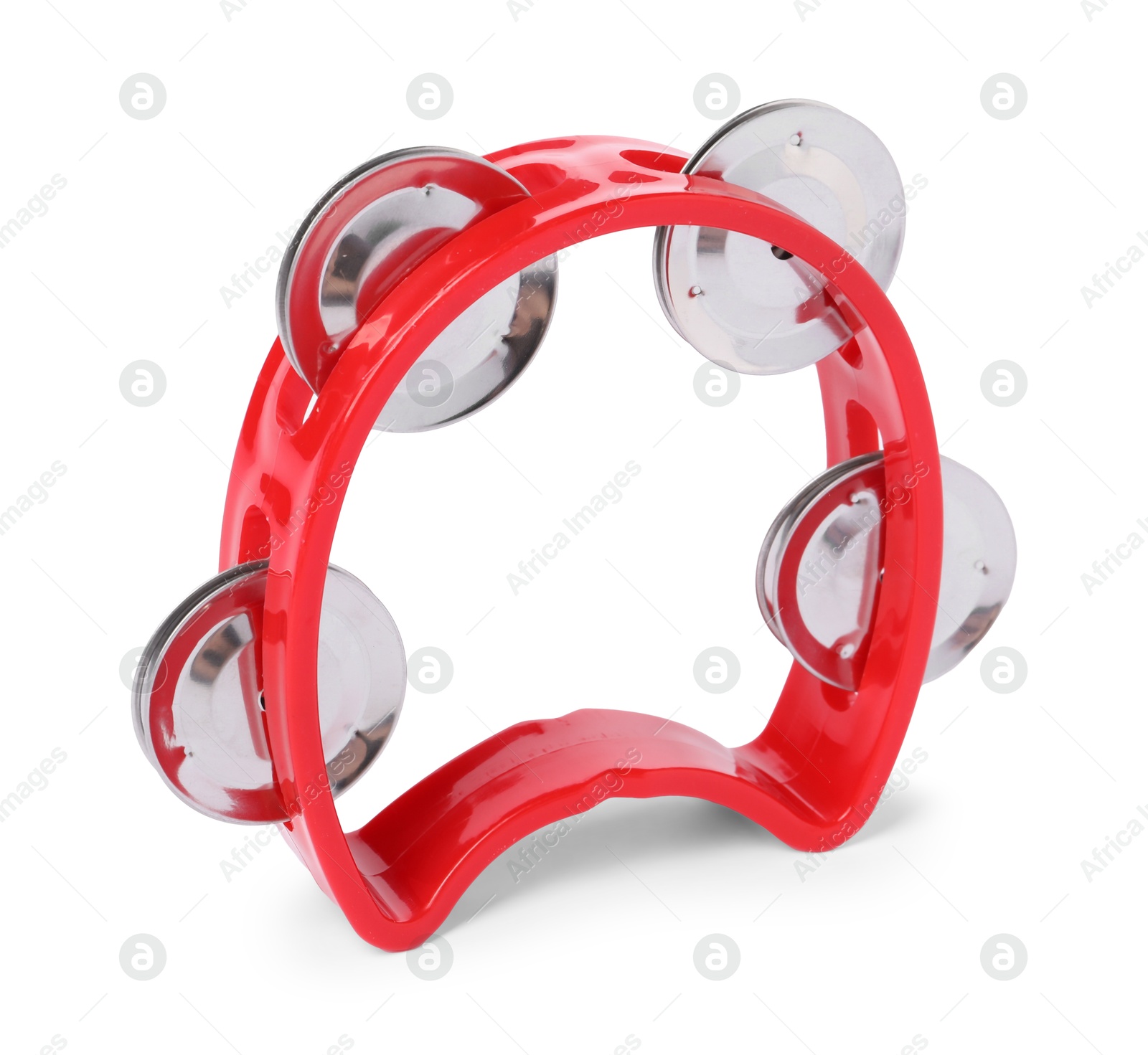 Photo of Red toy tambourine isolated on white. Child's musical instrument