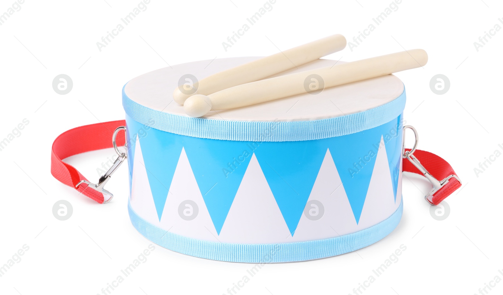 Photo of Toy drum with drumsticks isolated on white. Child's musical instrument