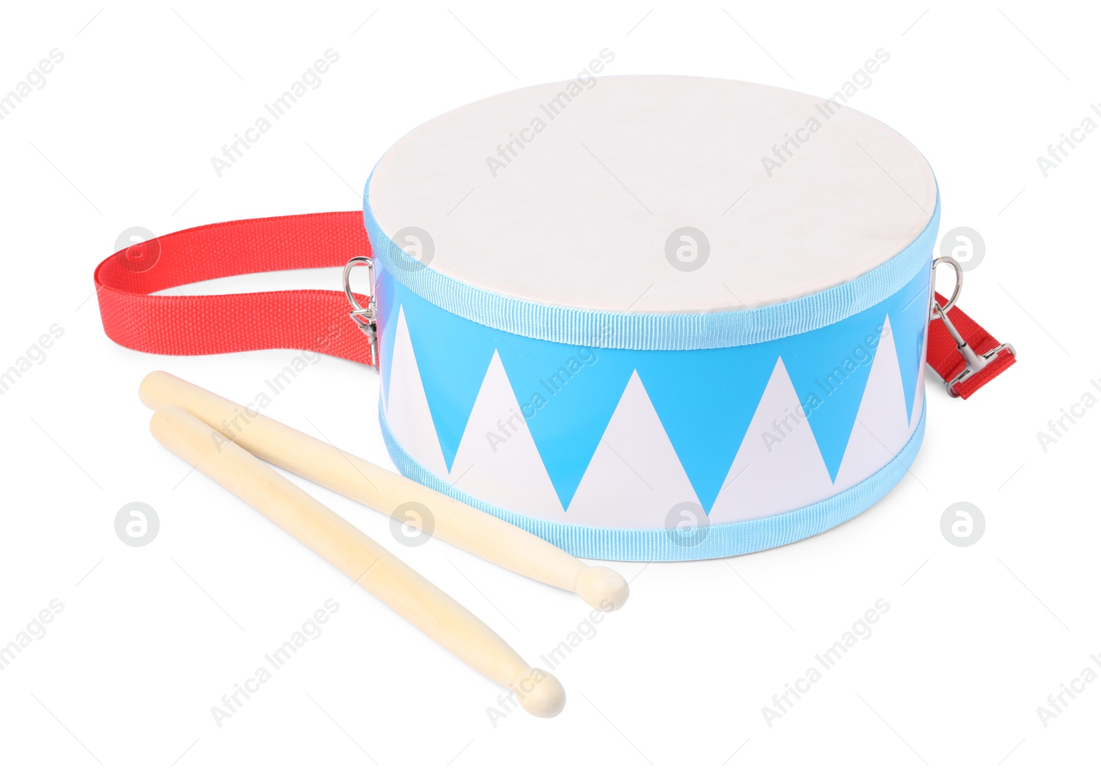 Photo of Toy drum with drumsticks isolated on white. Child's musical instrument