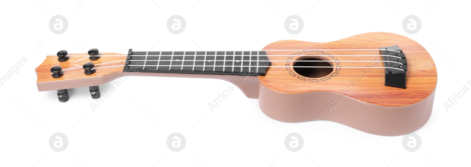 Photo of Wooden toy guitar isolated on white. Child's musical instrument