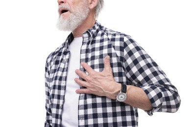 Photo of Heart attack. Senior man suffering from pain in chest on white background, closeup