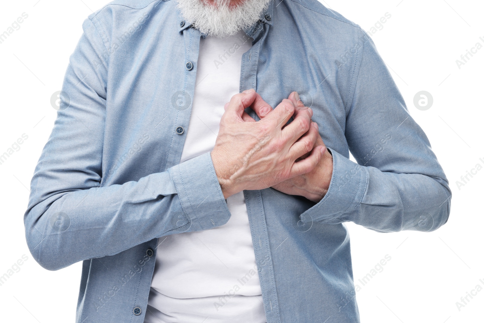 Photo of Heart attack. Senior man suffering from pain in chest on white background, closeup