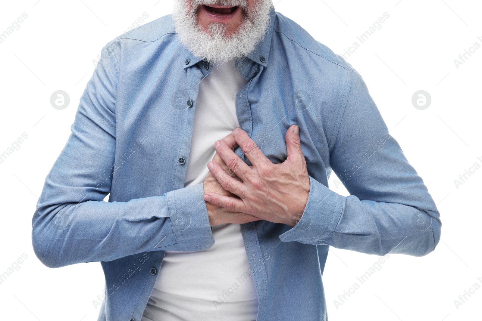 Photo of Heart attack. Senior man suffering from pain in chest on white background, closeup