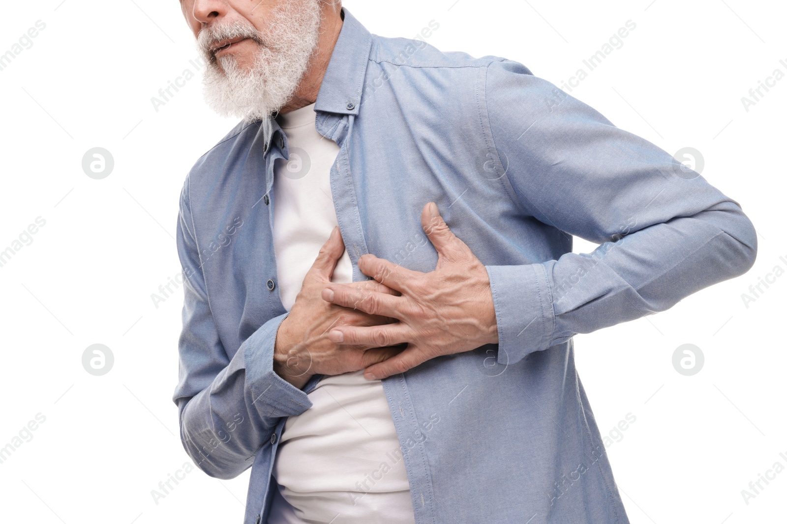 Photo of Heart attack. Senior man suffering from pain in chest on white background, closeup