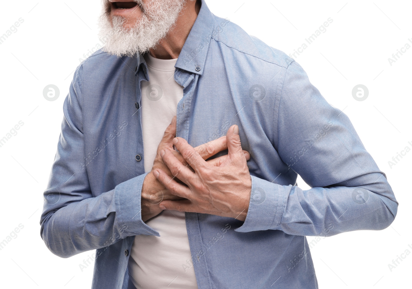 Photo of Heart attack. Senior man suffering from pain in chest on white background, closeup