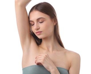 Photo of Young woman showing smooth skin after epilation on white background