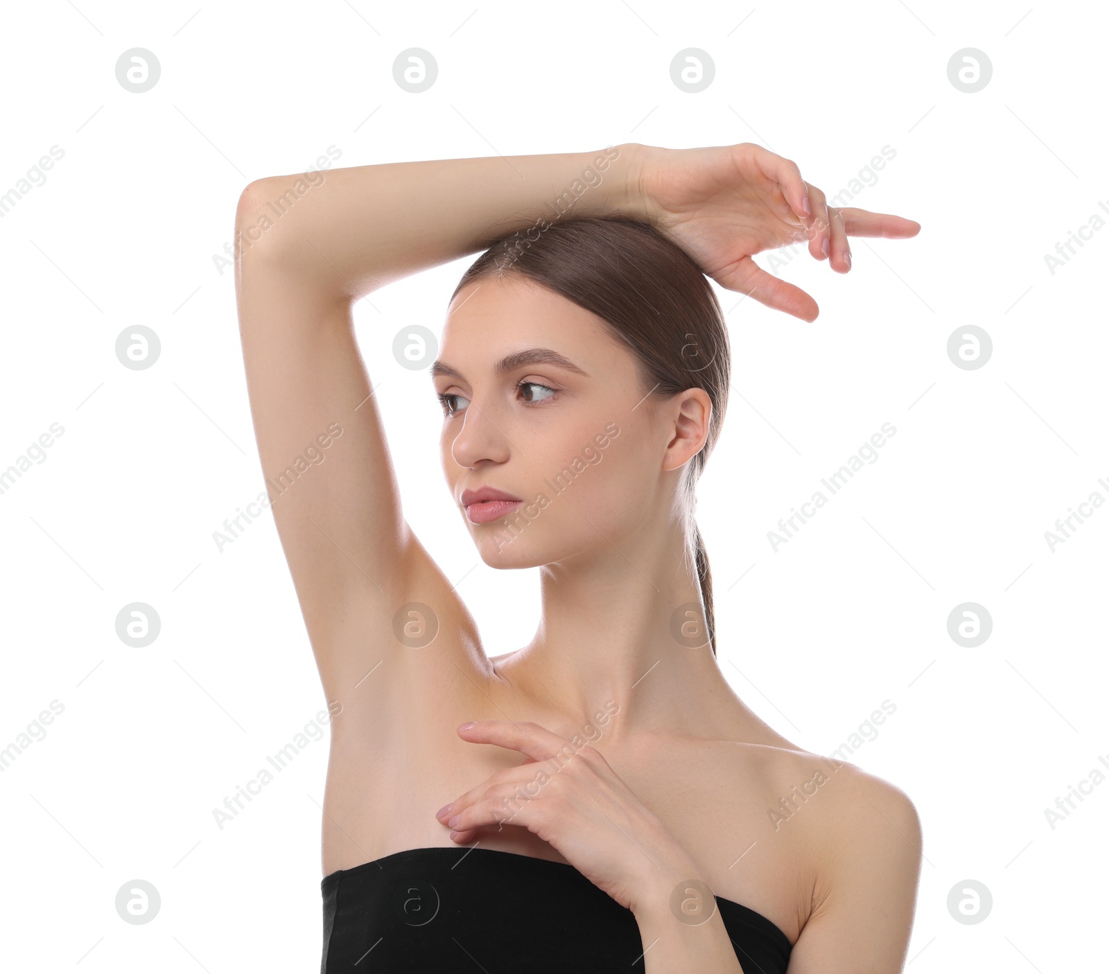 Photo of Young woman showing smooth skin after epilation on white background