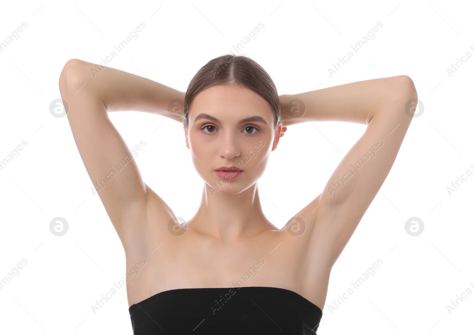 Photo of Young woman showing smooth skin after epilation on white background