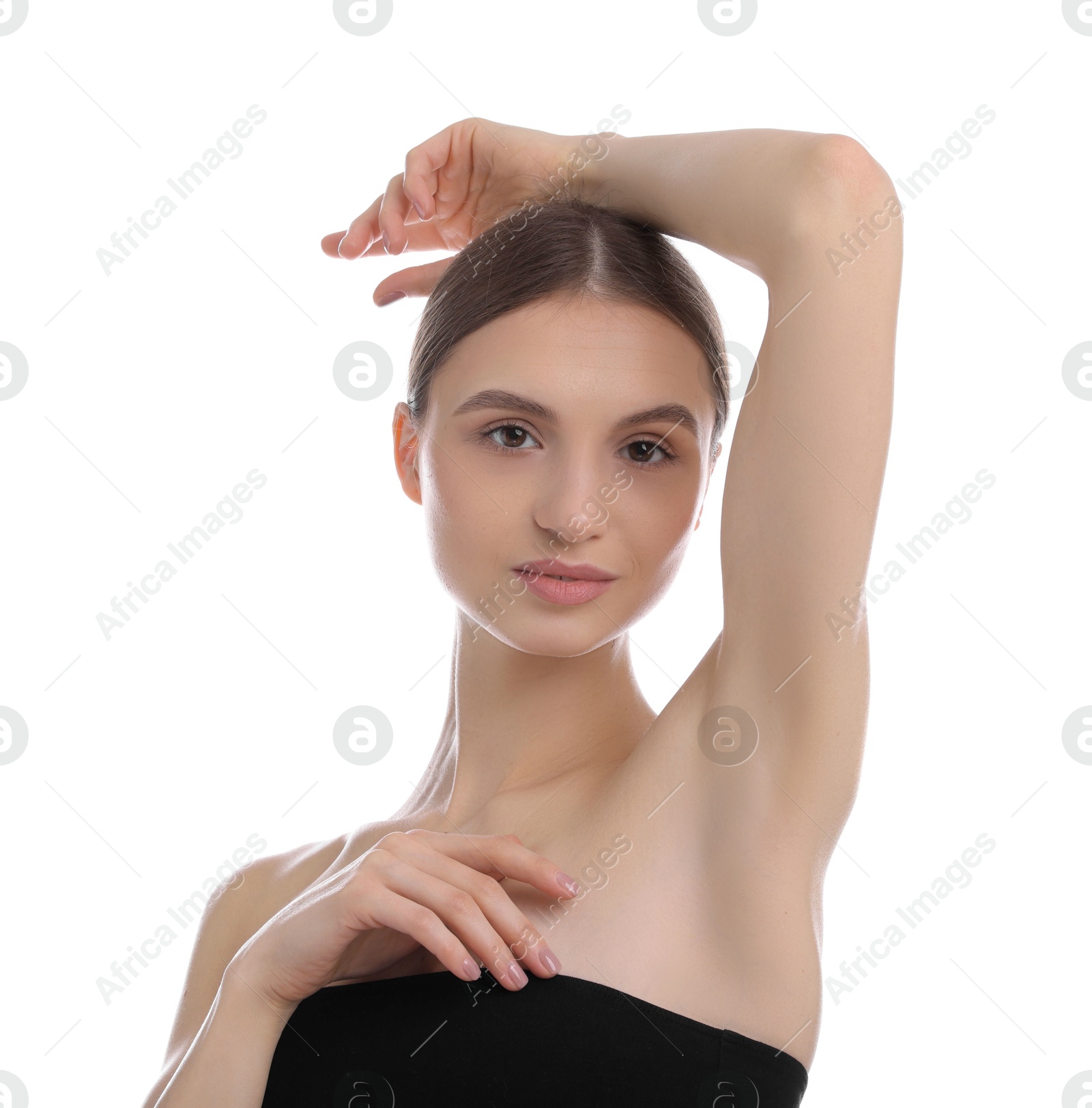 Photo of Young woman showing smooth skin after epilation on white background